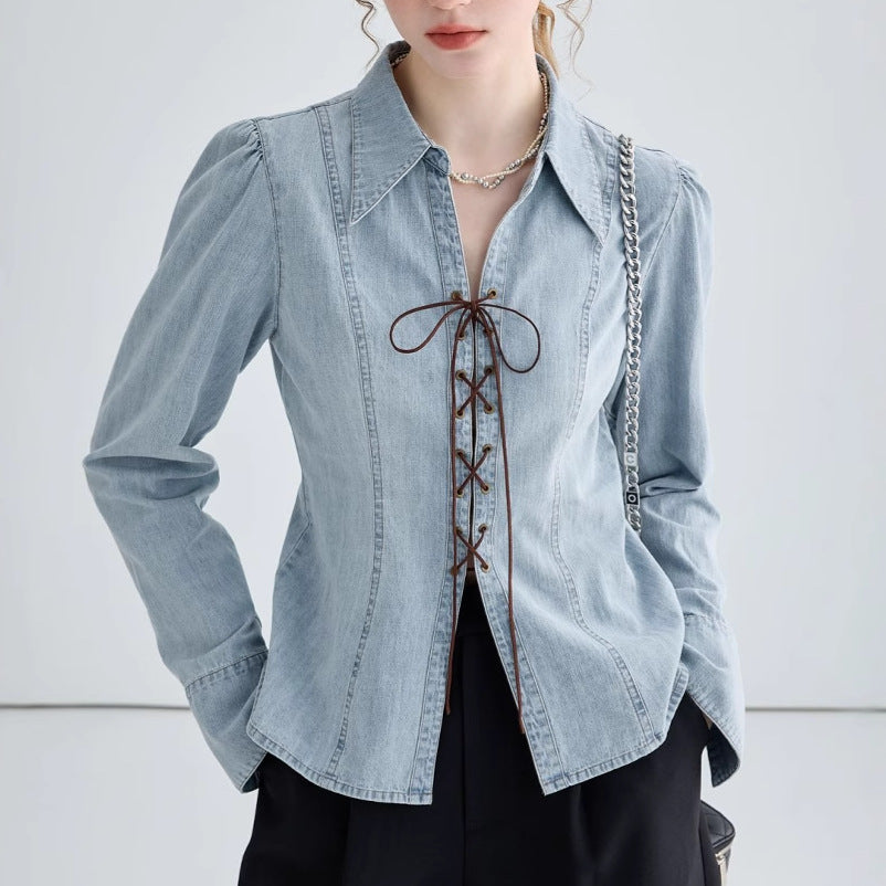 Ladies' jeans blouse with playful lacing details and elegant cut