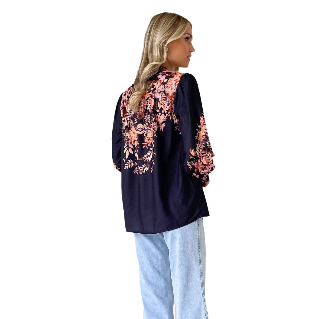 Long sleeve blouse for women with floral pattern and elastic sleeve cuffs Chic & Stil