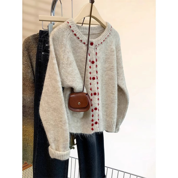 Pull en tricot douillet pour femmes avec détails de boutons colorés Chic & Stil