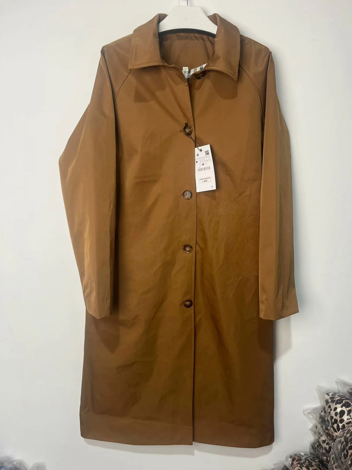 Transitional jacket for women with elegant high collar and practical button details Lune London