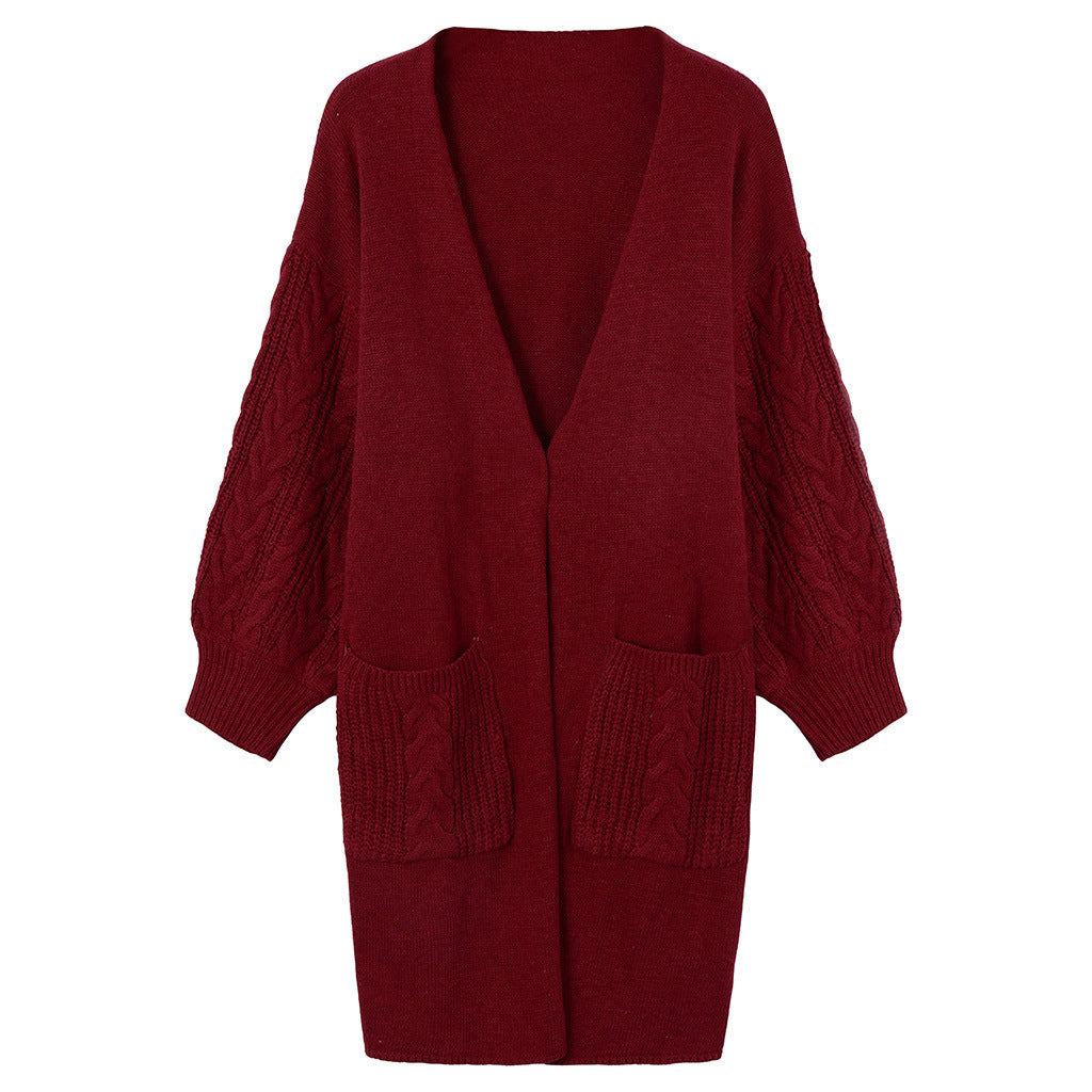 Knitted coat for women with deep V-neck and chunky knit details Lune London