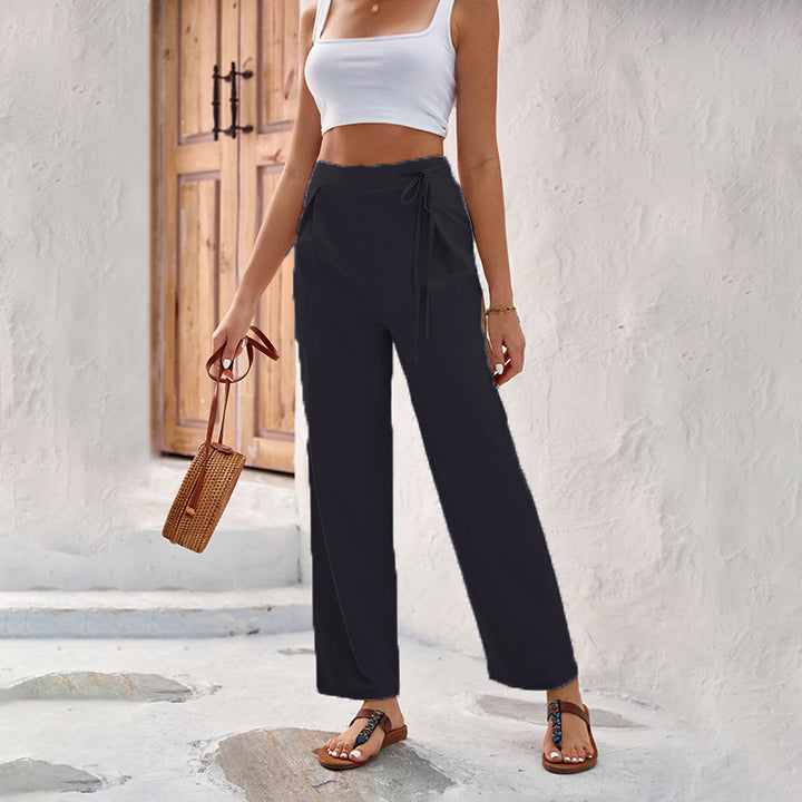 Loose summer pants for women with elastic waistband and tie belt Lune London