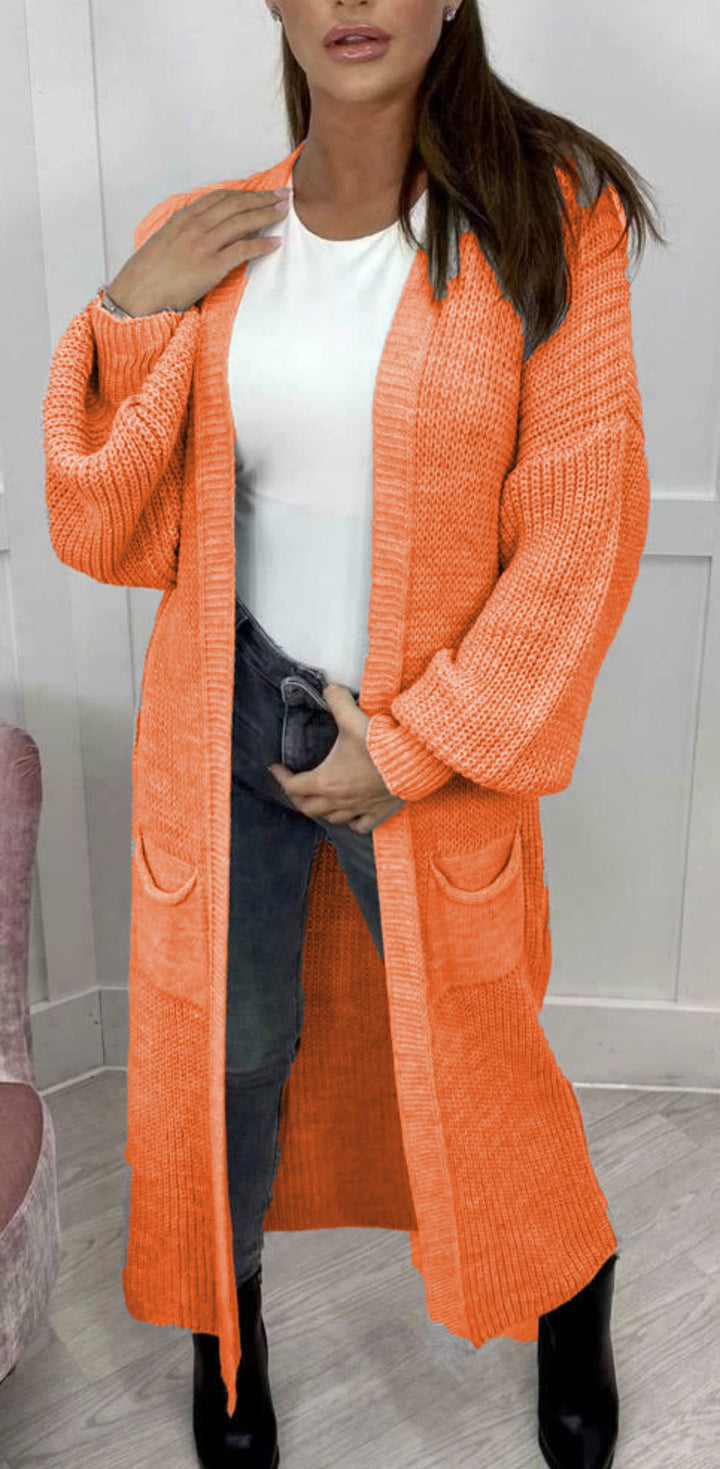 Ladies' knitted coat with deep pockets and modern details Lune London