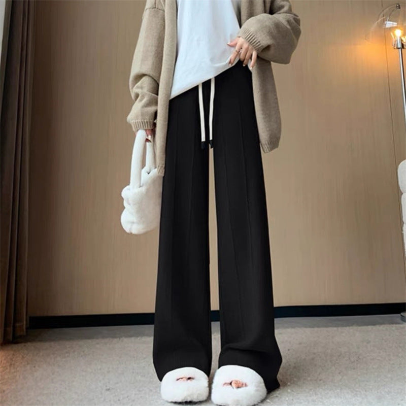 Pantalon de loisirs femme à coupe large avec taille élastique et poches pratiques Chic & Stil
