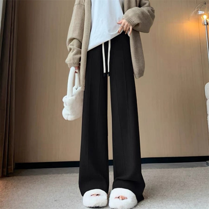 Pantalon de loisirs femme à coupe large avec taille élastique et poches pratiques Chic & Stil