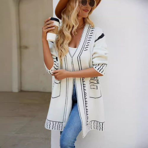 Elegant women's cardigan with deep V-neck and decorative seams Amarae