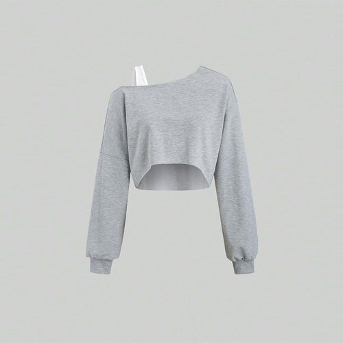 Sweat-shirt court pour femmes avec design asymétrique et manches volumineuses Chic & Stil