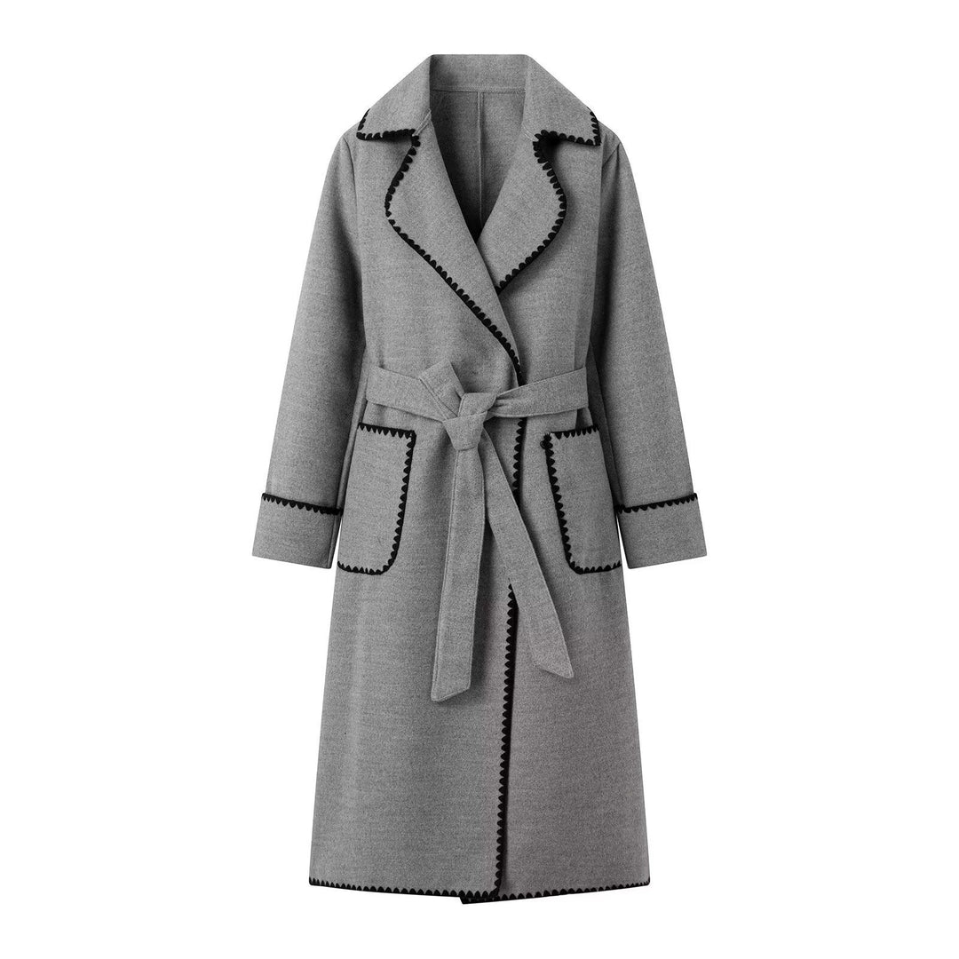 Elegant trench coat for women with contrast decorative trim and practical pockets Lune London