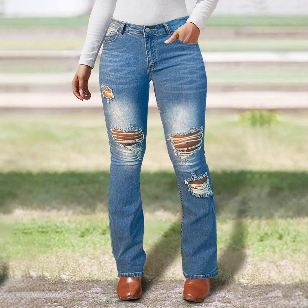 Women's waist-accentuated stretch denim jeans with flared leg and prominent knee rips Amarae