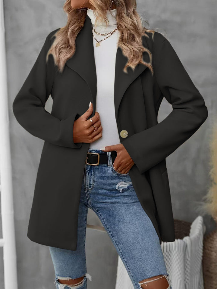 Ladies Elegant Oversized Jacket with Classic Cut and Chic Modern Buttons