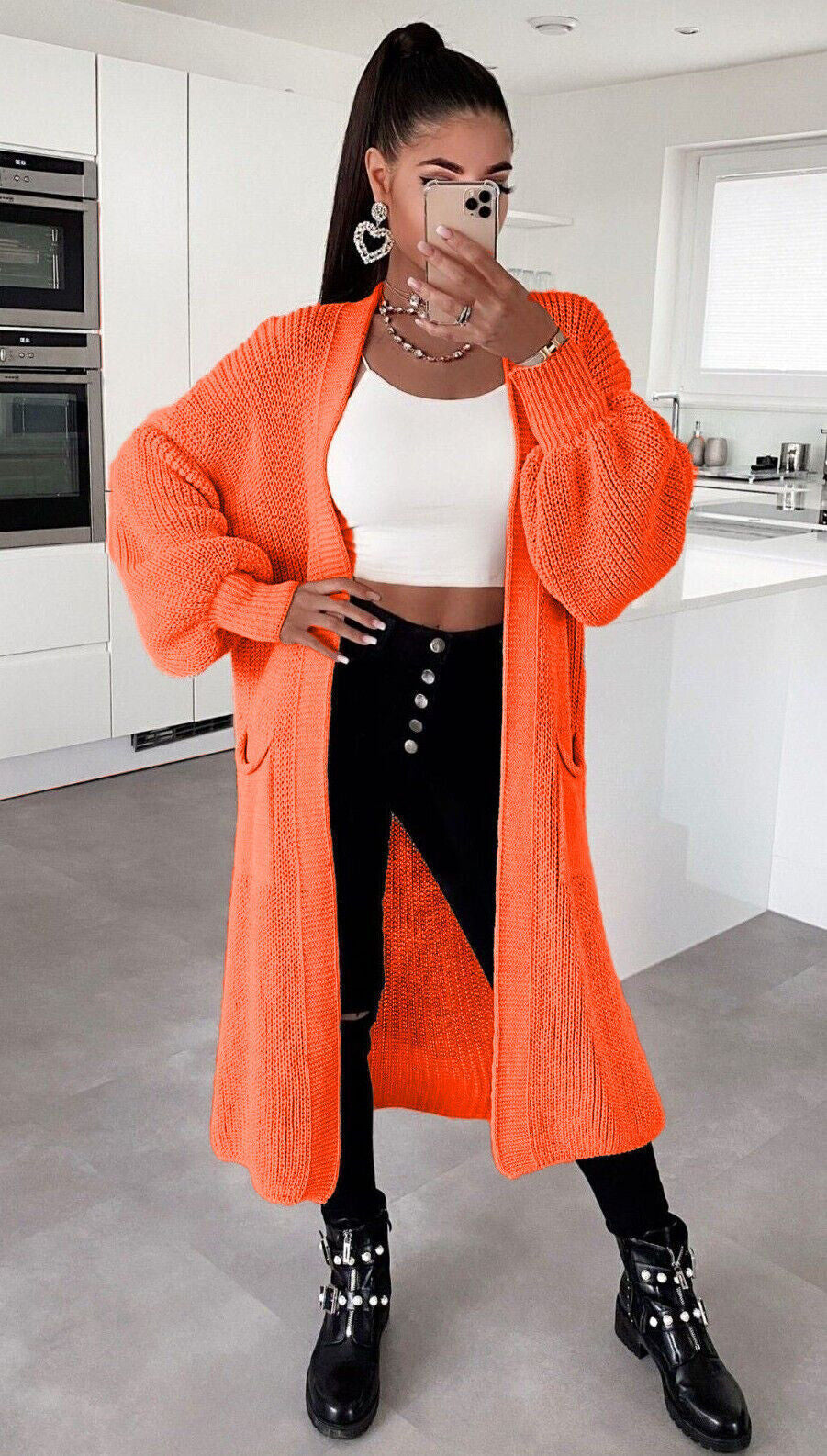 Ladies long cardigan with a chunky knit structure and practical pockets Lune London