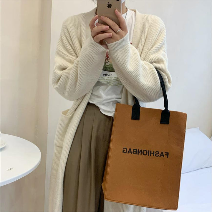 Cardigan en tricot épais pour femmes avec poches et coupe tendance Chic & Stil