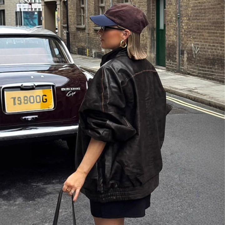 Women Oversize Faux Leather Coat with Distinct Decorative Seams and Stand-Up Collar Amarae