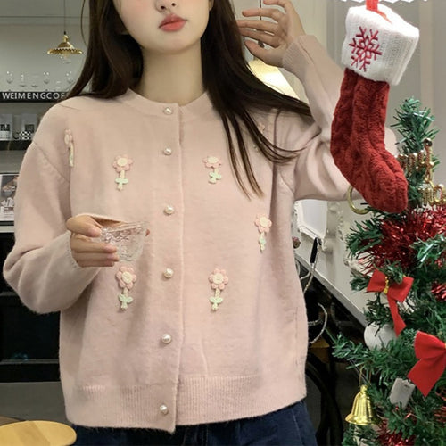 Femmes cardigan ludique avec un design floral et fermeture à boutons perles Amarae