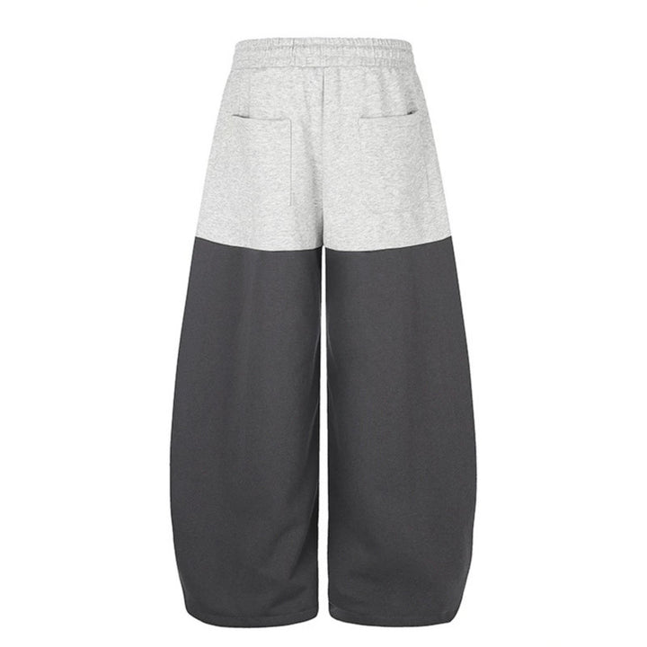 Women's Oversize Two-Tone Palazzo Sweatpants made of French Terry with logo studs, drawstring and adjustable hem.