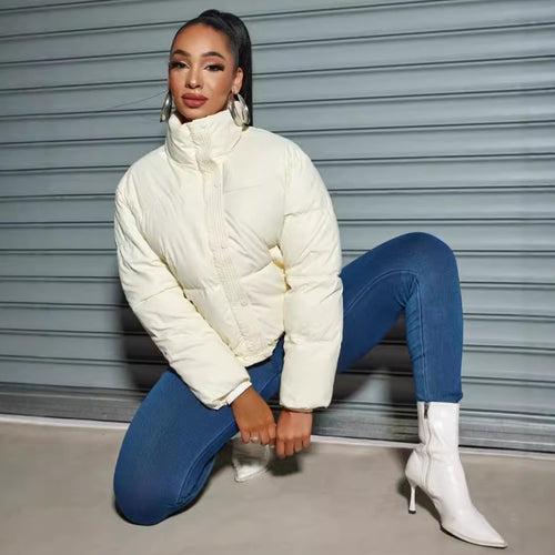 Women's quilted jacket with high collar and fitted cut
