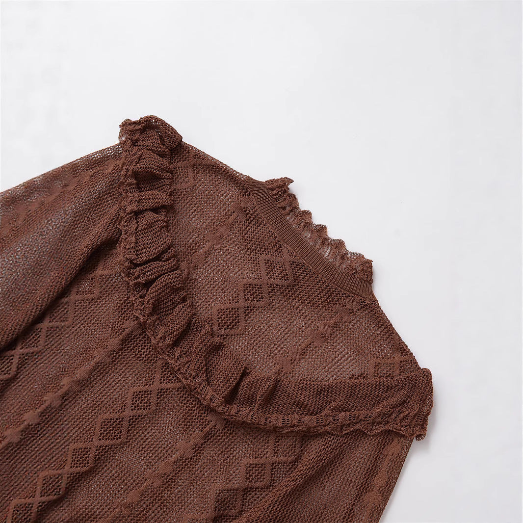 Ladies soft knit top with ruffle details and button placket Lune London