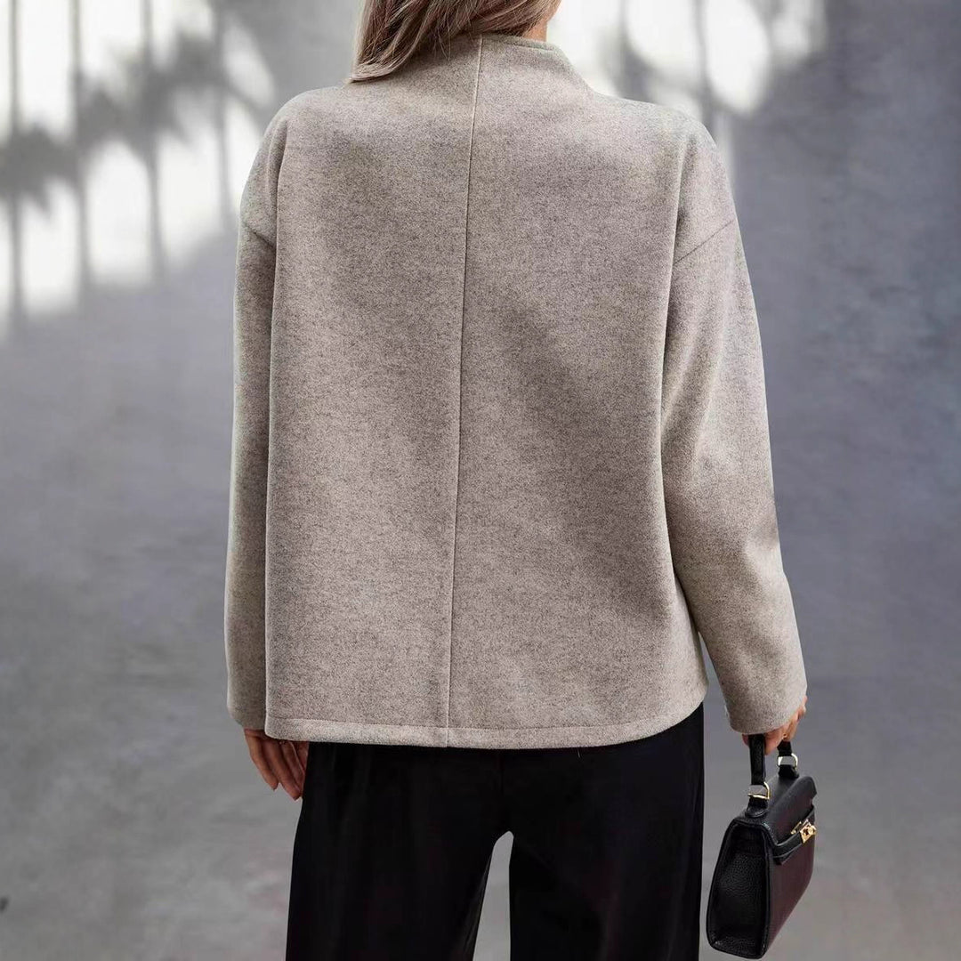 Elegant wool jacket for women with a chic look featuring a double-breasted button row Lune London