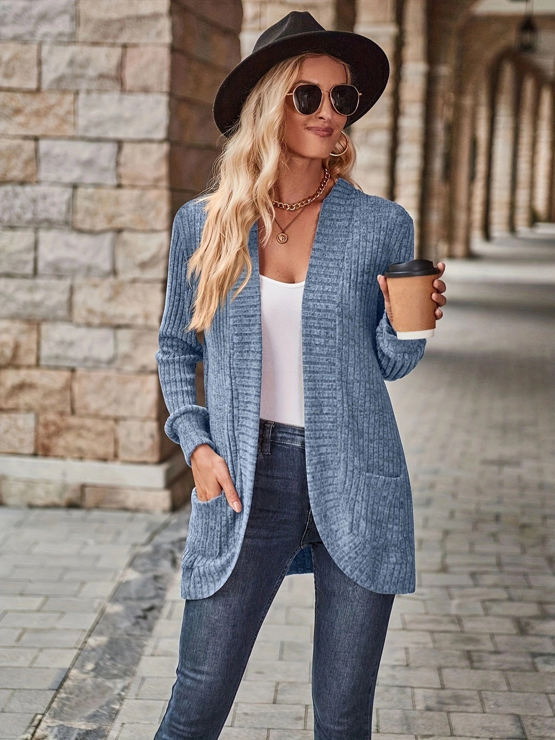 Women's knit jacket with structured design and practical pockets Lune London