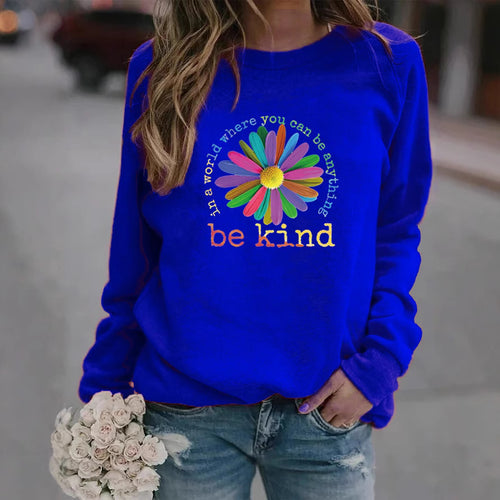 Sweatshirt pour femmes avec un design floral motivant coloré et un intérieur doux Chic & Stil