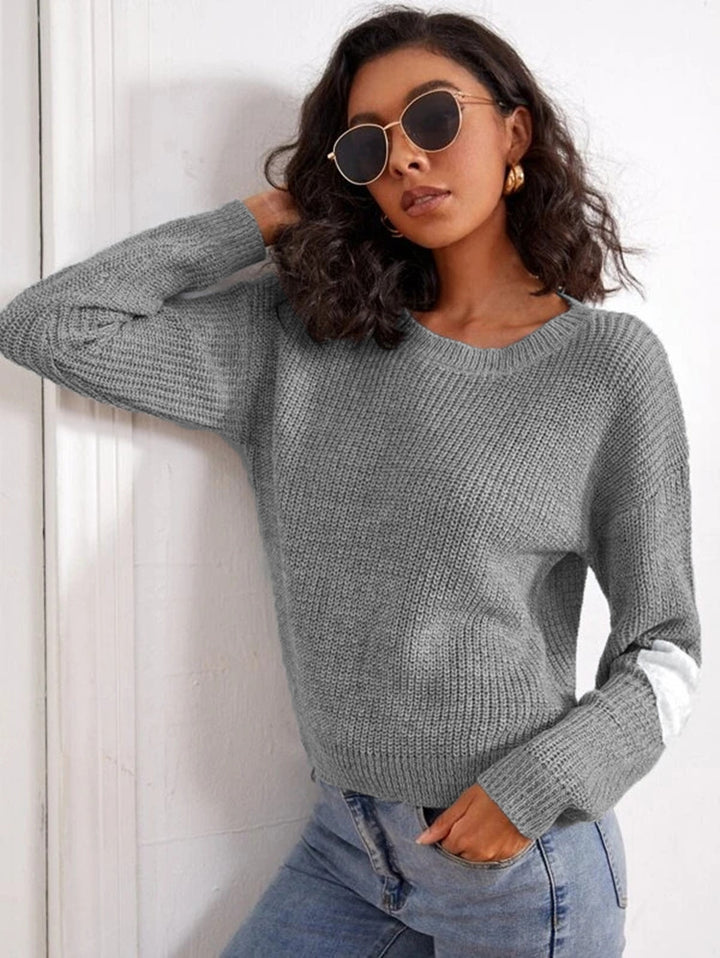 Trendy knitted sweater for women with contrasting sleeve accents Lune London