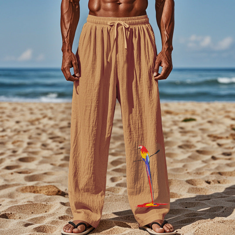 Light beach pants for men with colorful parrot design Lune London
