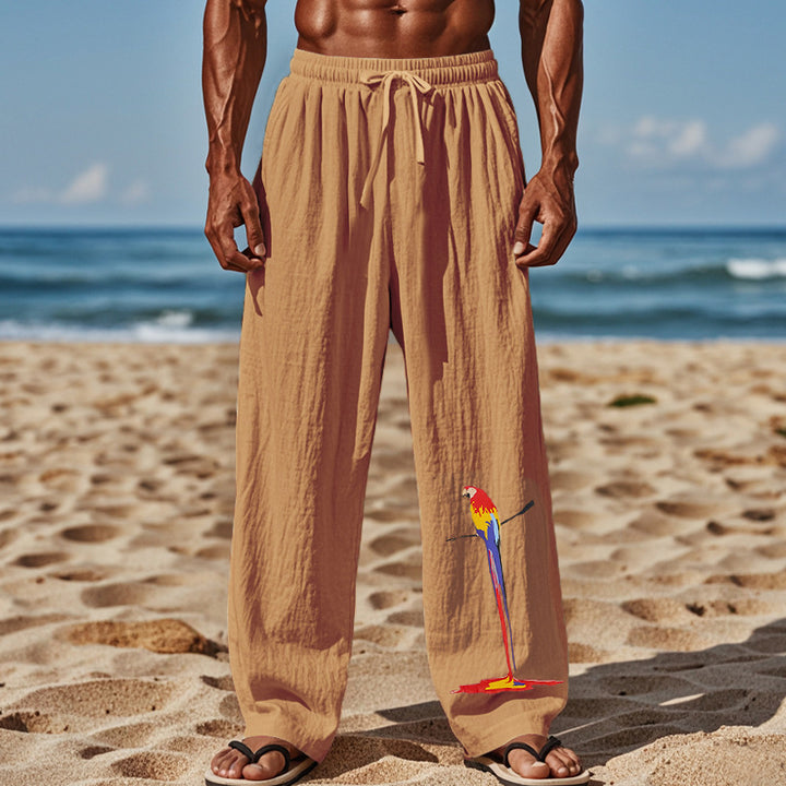 Light beach pants for men with colorful parrot design Lune London