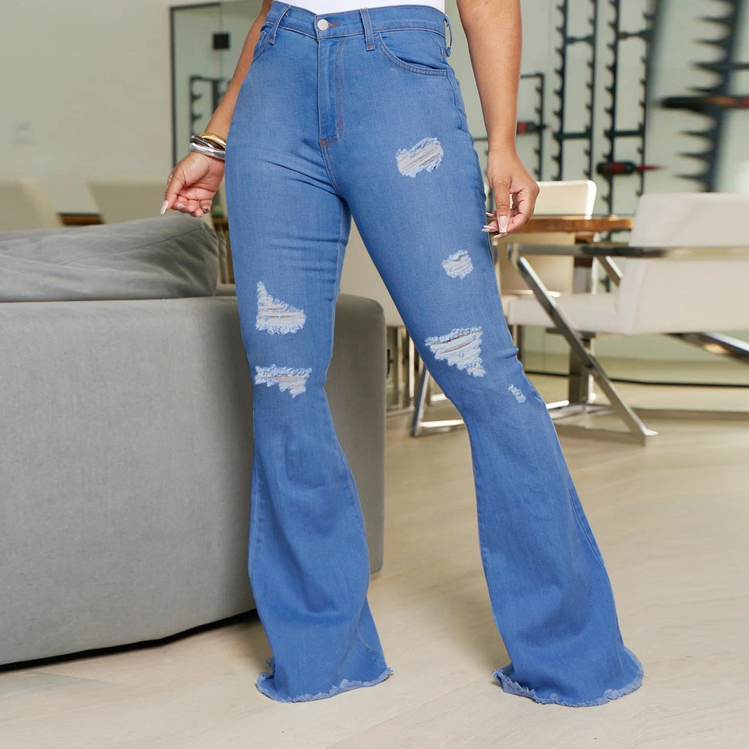Ladies' waist-fitting flared jeans with ripped inserts and raw hem Amarae