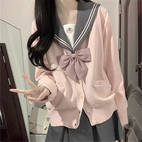 Cardigan féminin ludique avec grand col et détail de nœud Chic & Stil