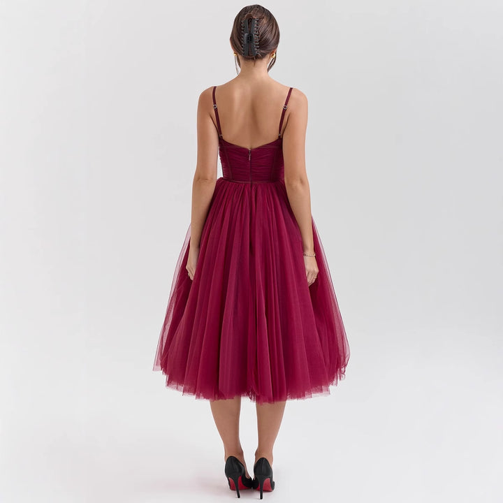 Ladies tulle dress with an elegant A-line silhouette and adjustable spaghetti straps Lune London