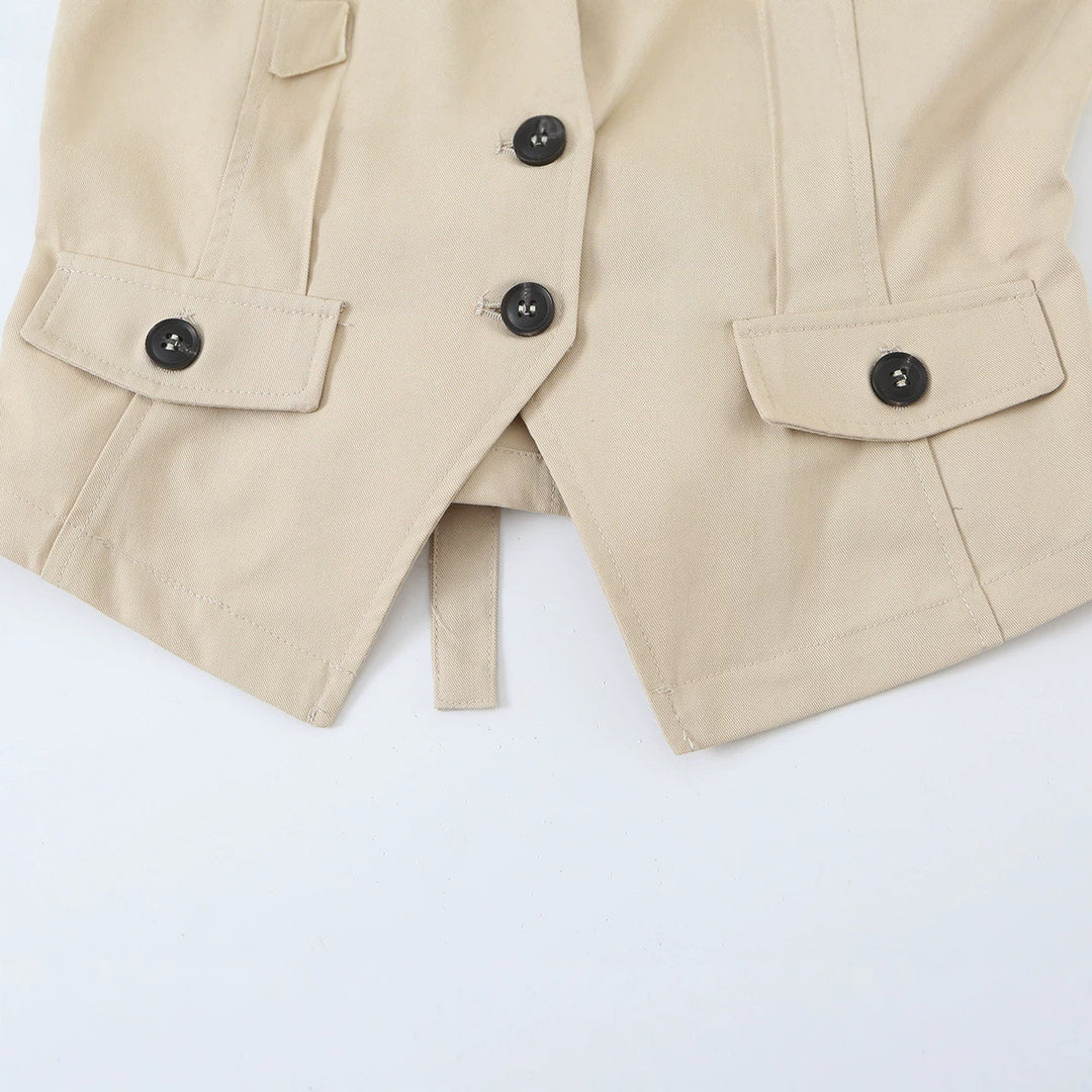 Women's sleeveless tailored trench vest with cut-out, shoulder flaps, and flap pockets Amarae