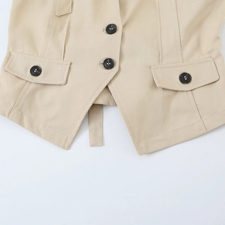 Women's sleeveless tailored trench vest with cut-out, shoulder flaps, and flap pockets Amarae
