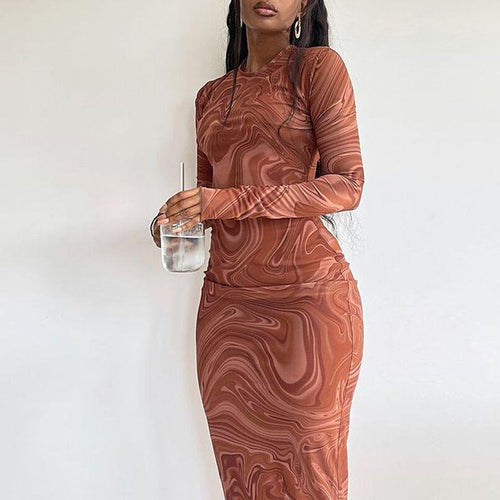 Elegant long-sleeve dress for women with a modern marble pattern and a fitted cut Amarae