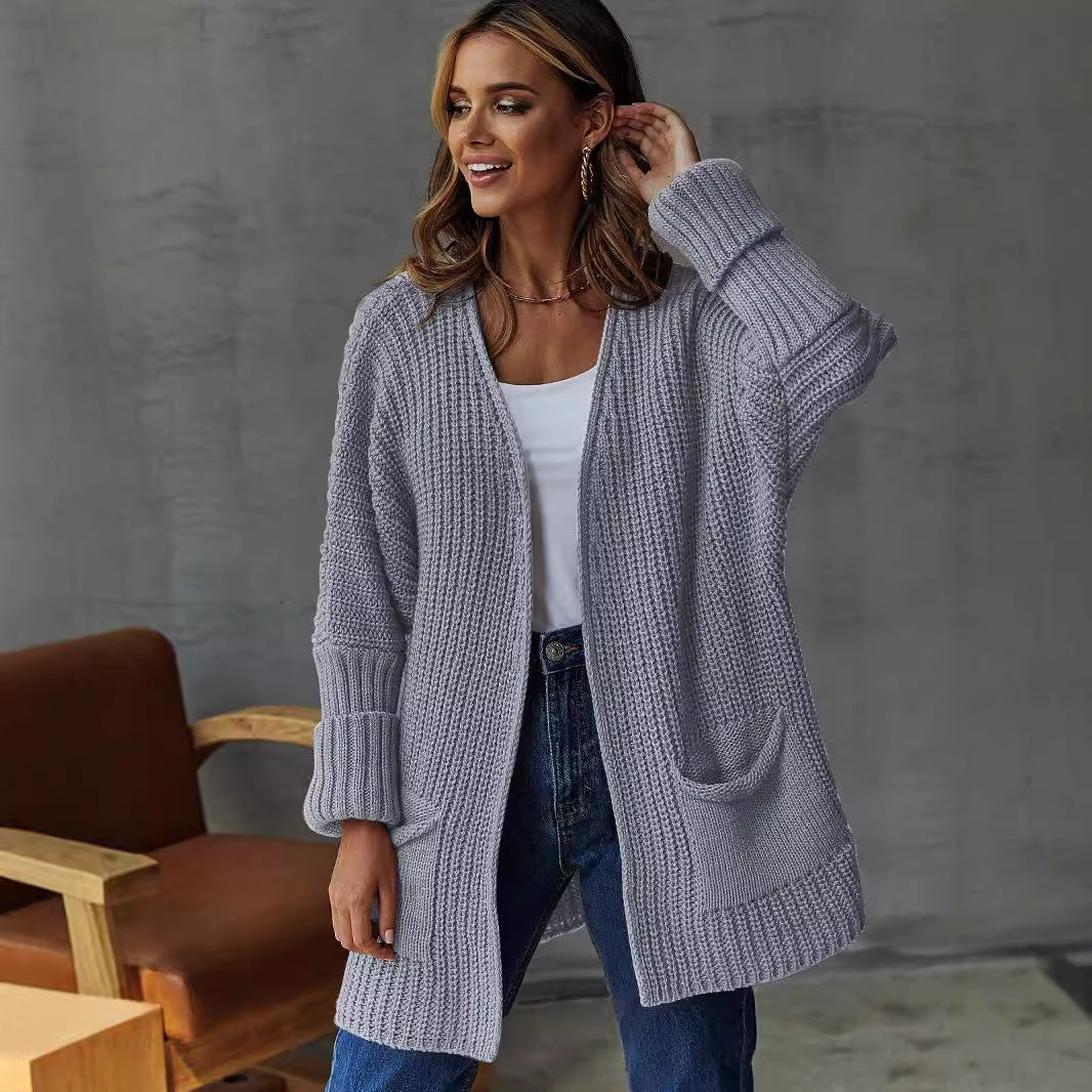 Ladies oversized knit cardigan with ribbed structure and pockets Lune London