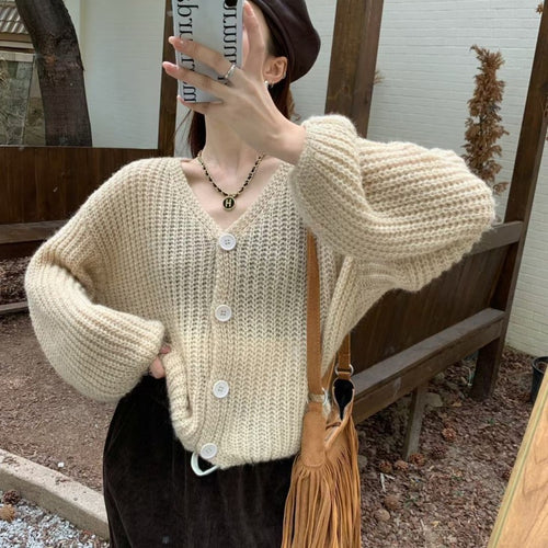 Cardigan décontracté pour femmes en maille épaisse avec des boutons pratiques Chic & Stil