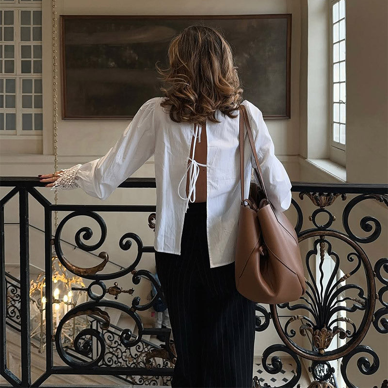 Blouse for women with elegant lace accents and puff sleeves Lune London