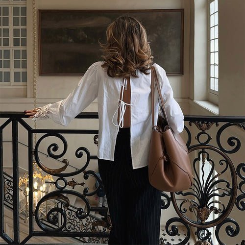 Blouse for women with elegant lace accents and puff sleeves Amarae