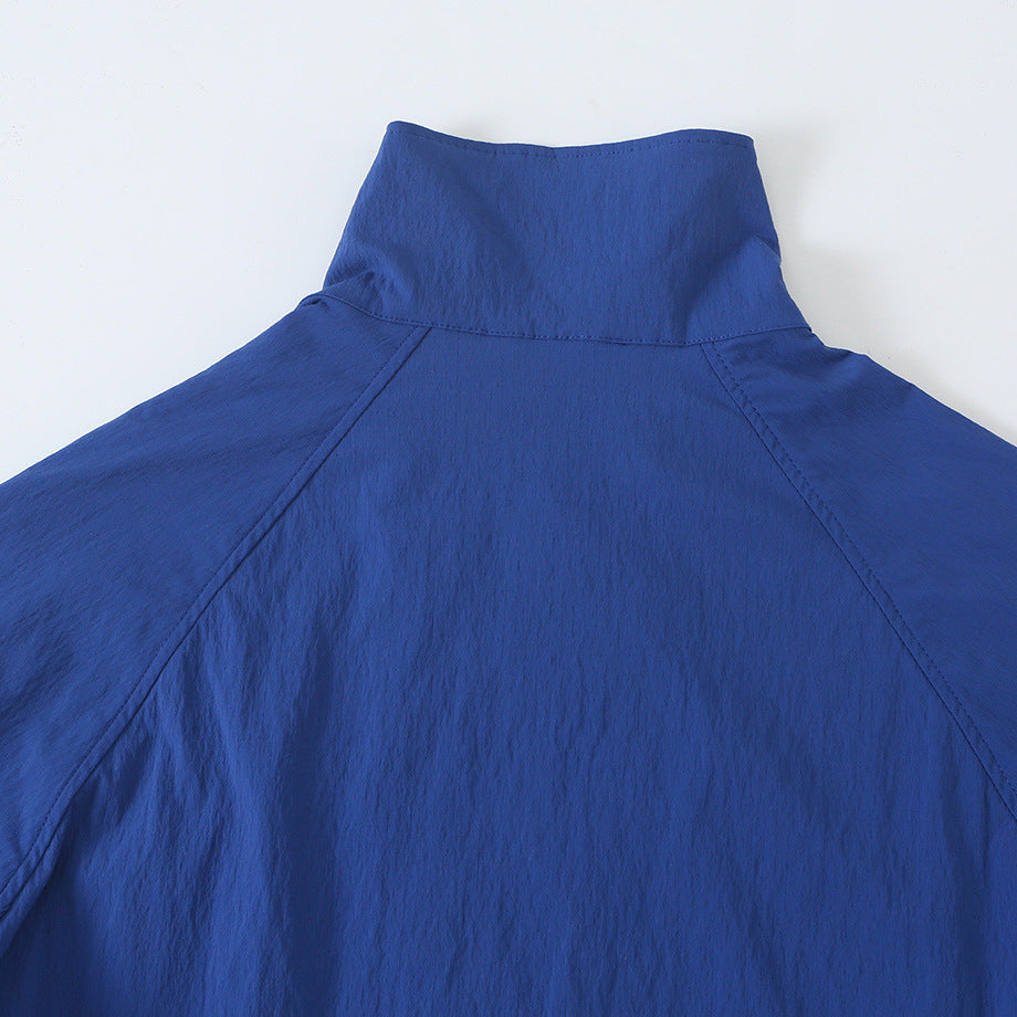 Women's Lightweight Cropped Windbreaker with Stand-Up Collar, Raglan Sleeves and Drawstring Amarae