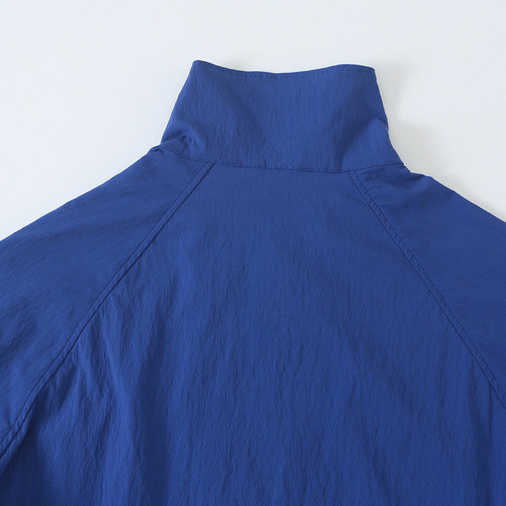 Women's Lightweight Cropped Windbreaker with Stand-Up Collar, Raglan Sleeves and Drawstring Amarae