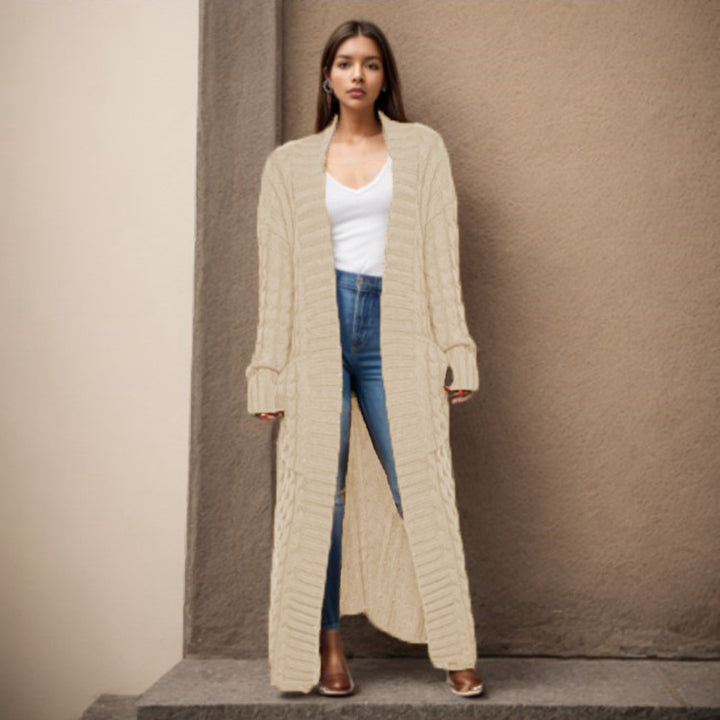 Women Thick knitted cardigan with a refined cable design and practical pockets Lune London