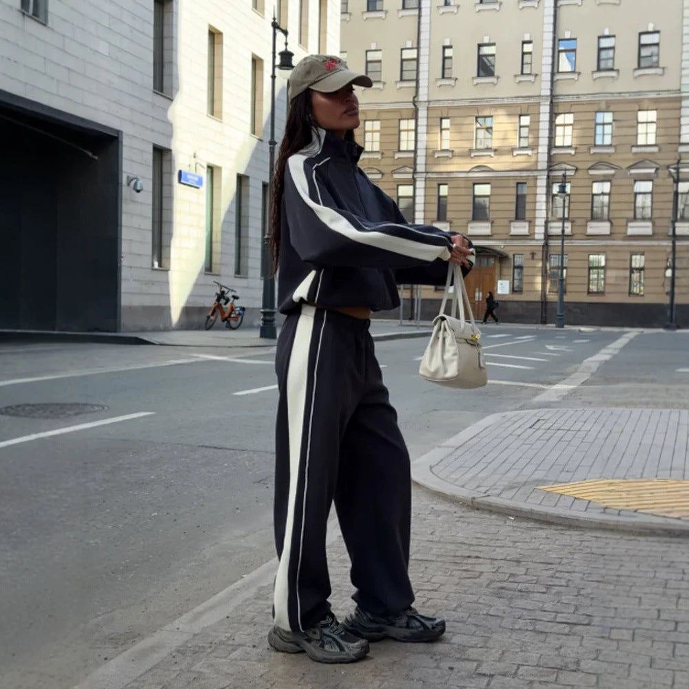 Women's oversized tracksuit with zip jacket, wide joggers, and contrast side stripes Amarae
