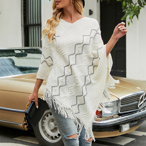 Amarae Elegant poncho for women with a striking textured pattern and decorative fringes