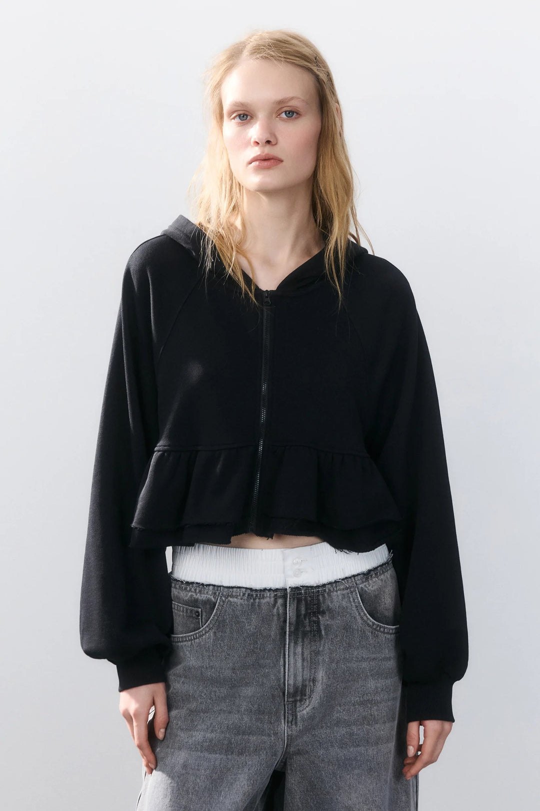Cropped hoodie for women with a playful ruffle design Lune London