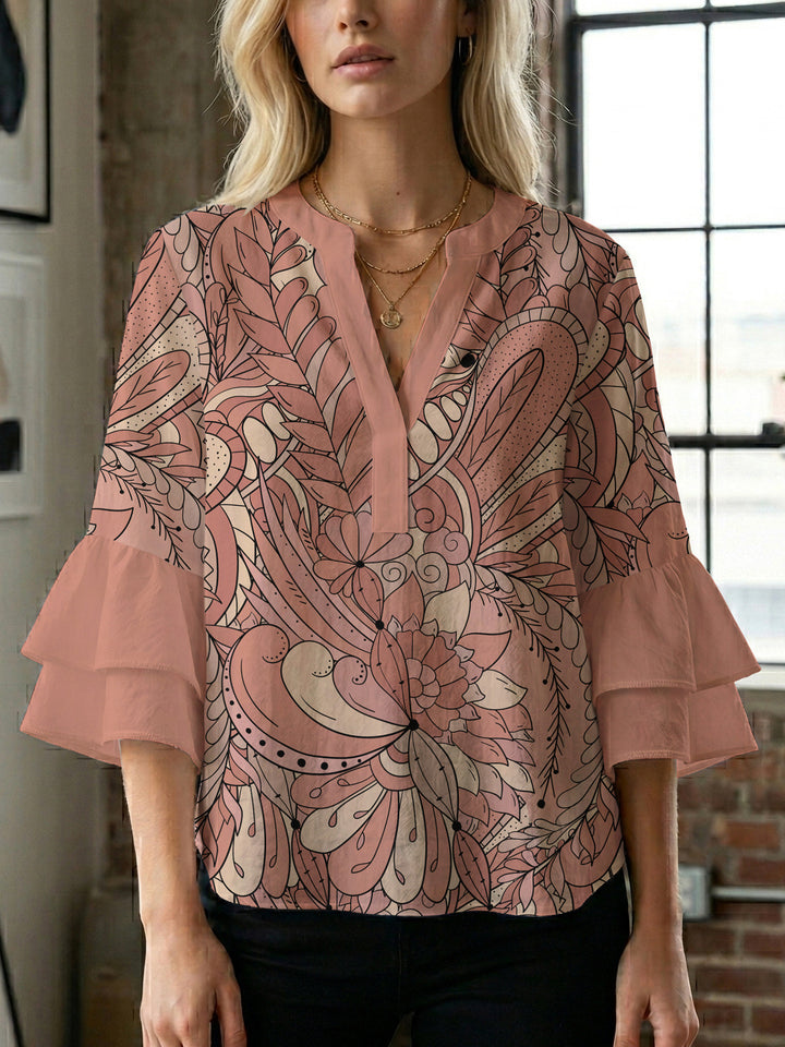 Ladies elegant top with voluminous ruffle hems and floral design Lune London