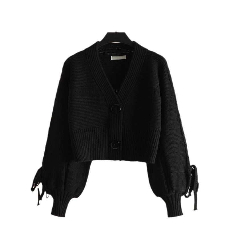 Cardigan féminin à la mode avec des manches volumineuses et des détails de bouton Chic & Stil