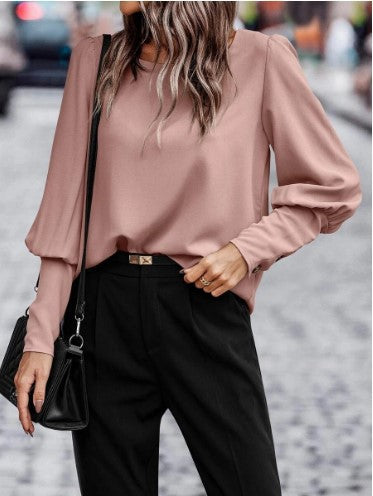 Elegant women's blouse with puff sleeve details and structured fabric Lune London