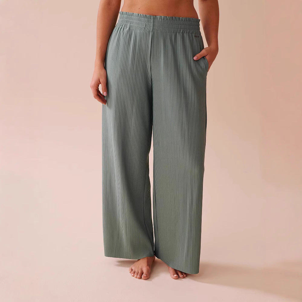 Casual pleated pants for women with elastic waistband and side pockets Lune London
