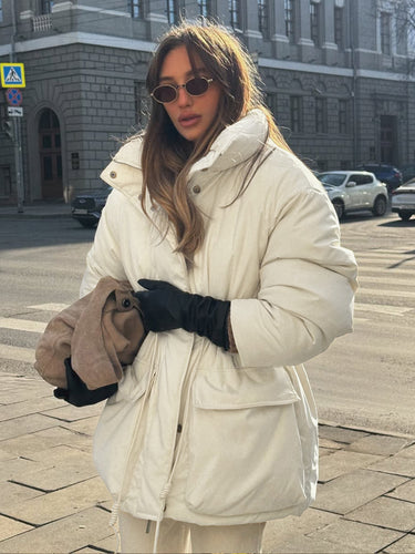Quilted winter jacket for women with high collar and practical drawstring waist Amarae