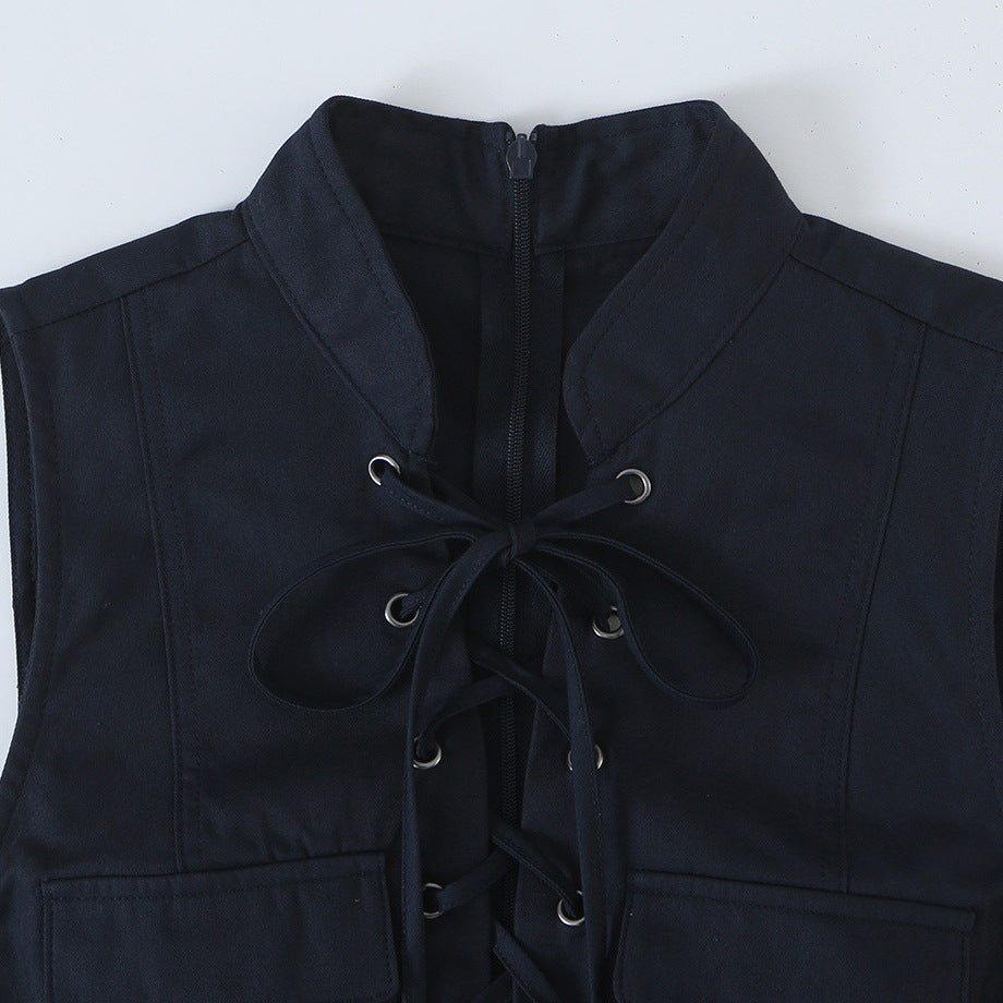 Ladies sleeveless sheath dress with front lacing, stand-up collar and patch pockets Amarae