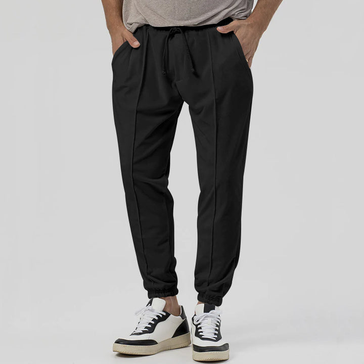 Sporty men's joggers with elastic waistband and zippers Lune London